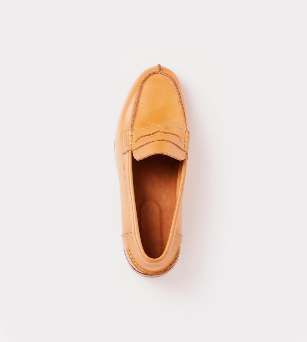 Hand made moccasin in natural leather - front