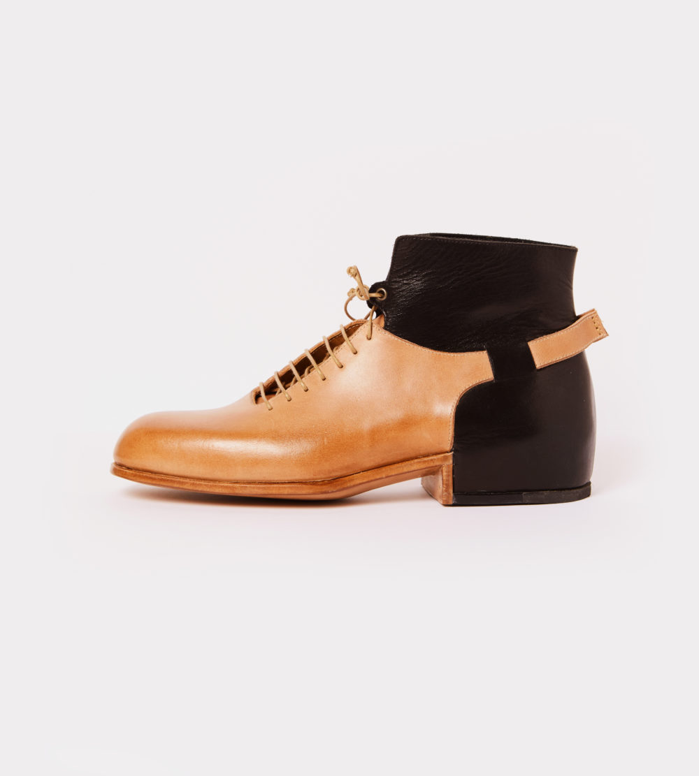 Lace up ankle boot in black and natural leather - left view