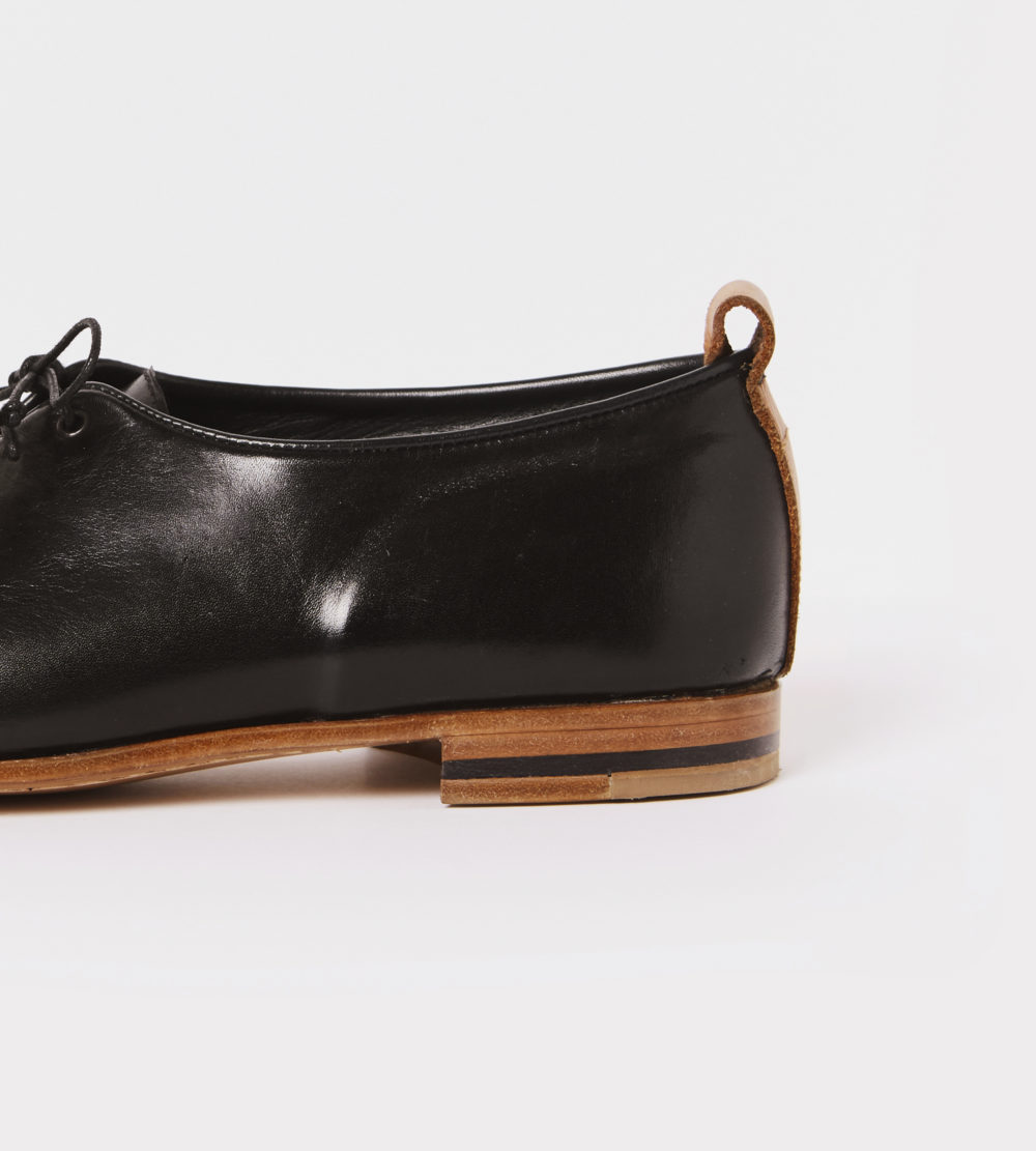 Wholecut black leather shoes - detail