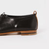 Wholecut black leather shoes - detail